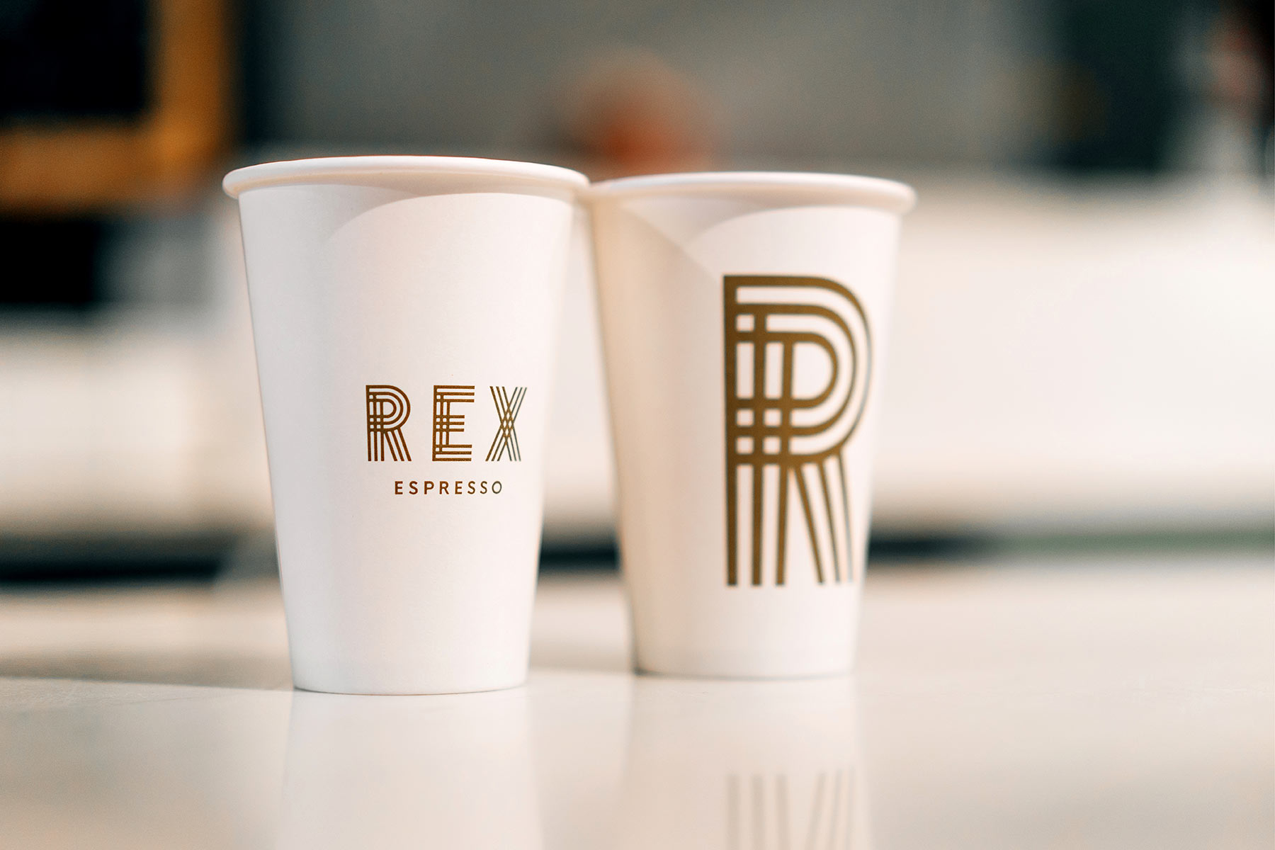 Rex Espresso branding - takeaway cups